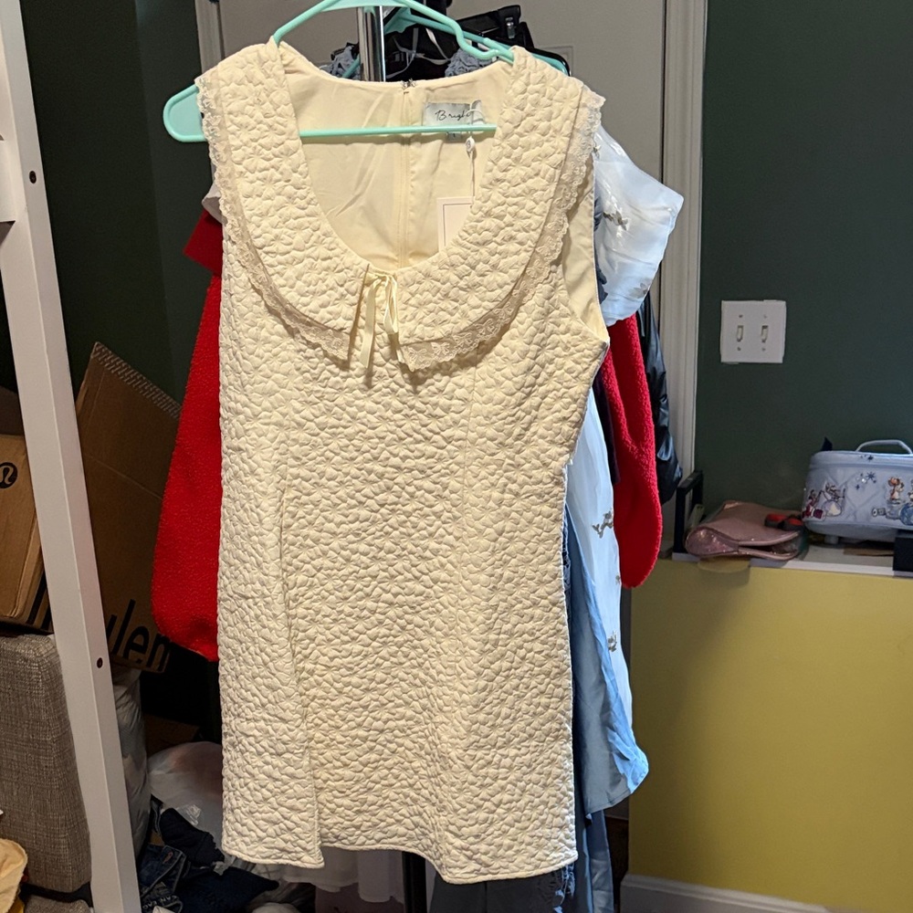 Elegant Cream Sleeveless Dress